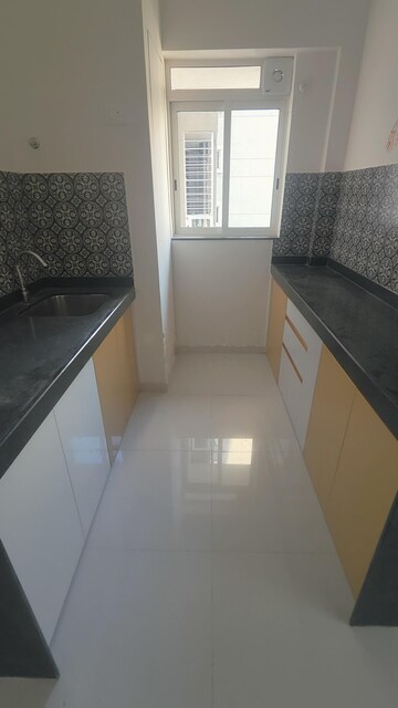 Kitchen in 2 BHK Apartment at Lodha Amara, Kolshet Road – for Rent