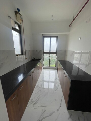 Kitchen in 2 BHK Apartment at Raymond Ten X Habitat, Pokhran Road No 2 – for Rent
