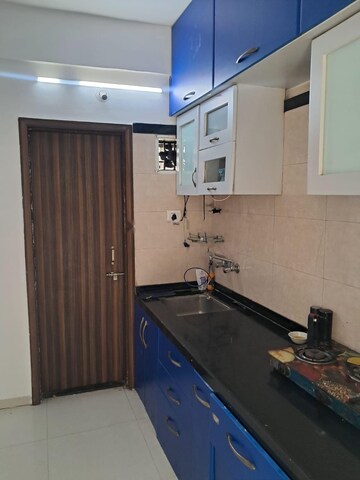 Kitchen in 2 BHK Apartment at PGD Pinnacle, Mundhwa – for Rent
