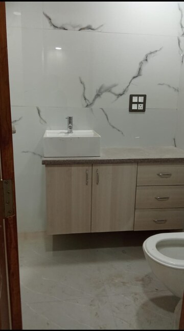 Bathroom in 4 BHK Builder Floor at Freedom Fighters Enclave – for Sale