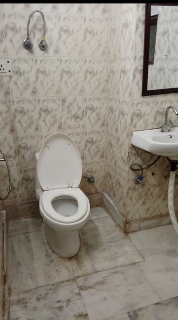 Bathroom in 4 BHK Builder Floor at Freedom Fighters Enclave – for Rent