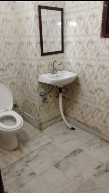 Bathroom in 4 BHK Builder Floor at Freedom Fighters Enclave – for Rent