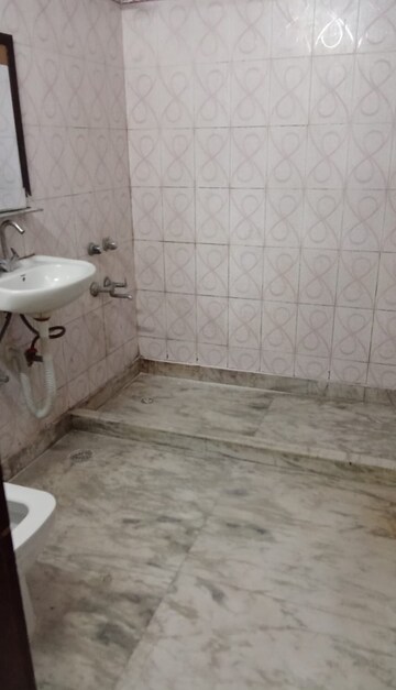 Bathroom in 4 BHK Builder Floor at Freedom Fighters Enclave – for Rent
