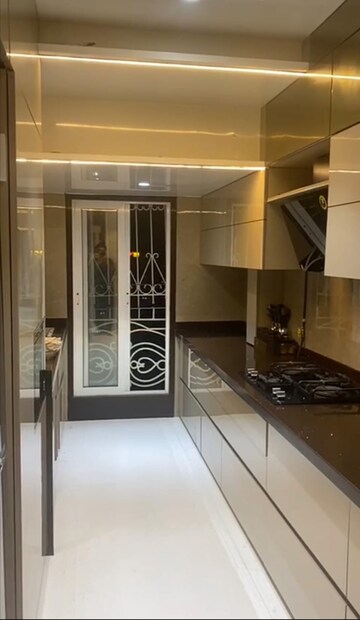 Kitchen in 4 BHK Apartment at Tharwani Heights, Sanpada – for Sale