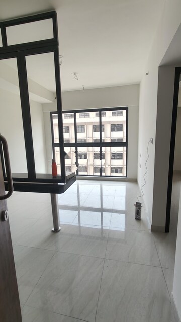 Living Room in 2 BHK Apartment at Lodha Crown Quality Homes, Majiwada – for Rent
