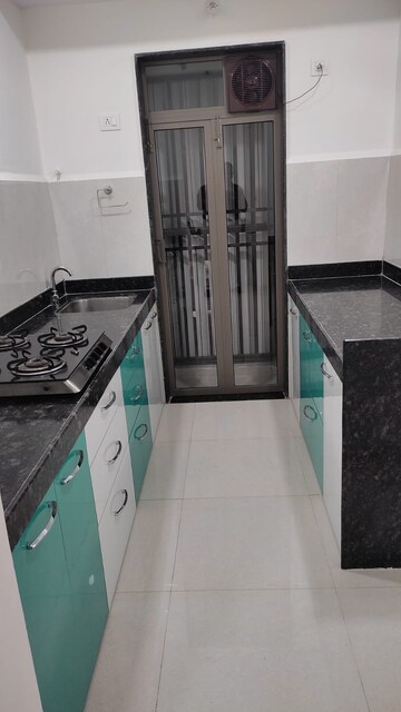 Kitchen in 3 BHK Apartment at Runwal My City, Dombivli East – for Rent