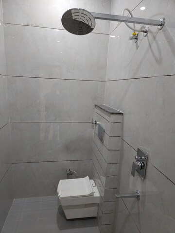 Bathroom in 3 BHK Apartment at Affinity Greens, International Airport Road – for Rent