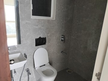 Bathroom in 1 BHK Apartment at Mahindra Roots, Kandivali East – for Rent