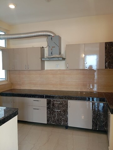 Kitchen in 3 BHK Apartment at Omaxe The Palace, Gomti Nagar – for Rent