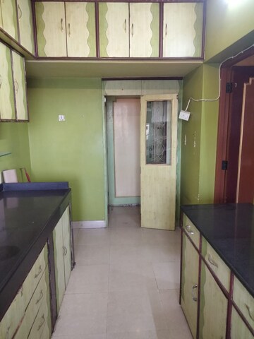 Kitchen in 2 BHK Apartment at Lokhandwala Whispering Palms, Kandivali East – for Rent