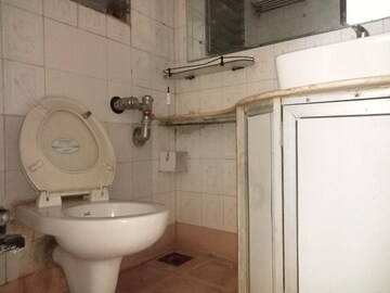 Bathroom in 3 BHK Apartment at Lokhandwala Whispering Palms, Kandivali East – for Sale