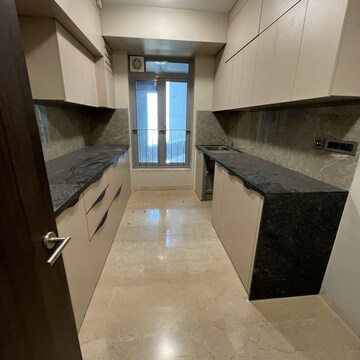Kitchen in 3 BHK Apartment at Oberoi Sky City, Khande Rao Dongari – for Rent