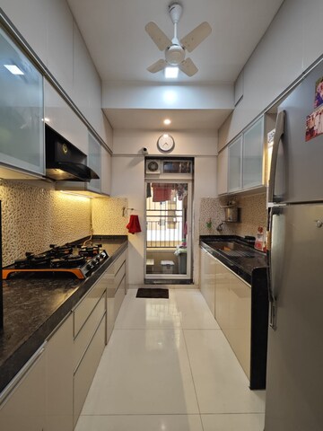 Kitchen in 2 BHK Apartment at Rustomjee Azziano Wing E, Majiwada – for Sale
