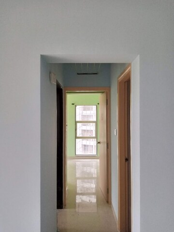 Living Room in 2 BHK Apartment at DB Realty Parkwoods, Kasarvadavali – for Rent