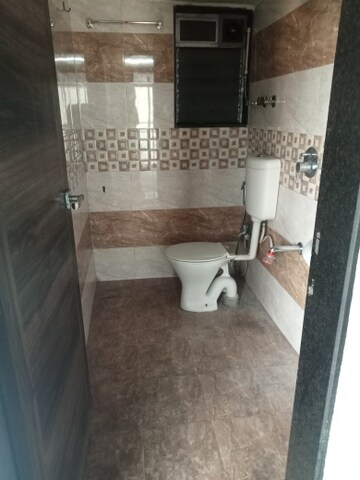 Bathroom in 2 BHK Apartment at Raj Akshay, Mira Road – for Rent