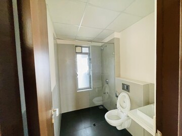Bathroom in 1.5 BHK Apartment at Dosti West County, Balkum Pada – for Rent