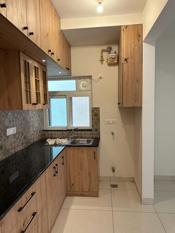 Kitchen in 2 BHK Apartment at Brigade Bricklane, Jakkuru – for Rent
