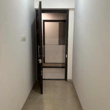 Building Lobby in 2 BHK Apartment at Divine Aspen Garden, Sonawala Industry Estate – for Sale