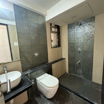 Bathroom in 2 BHK Apartment at Divine Aspen Garden, Sonawala Industry Estate – for Sale