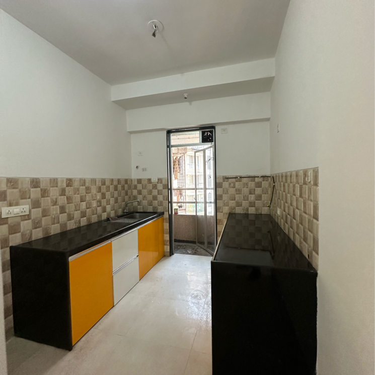 Kitchen, divine-aspen-garden 2 Bedroom 755 Sq.Ft. Apartment In Sonawala Industry Estate Mumbai 7937507