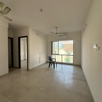 Living Room in 2 BHK Apartment at Divine Aspen Garden, Sonawala Industry Estate – for Sale