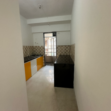 Kitchen in 3 BHK Apartment at Divine Aspen Garden, Sonawala Industry Estate – for Sale