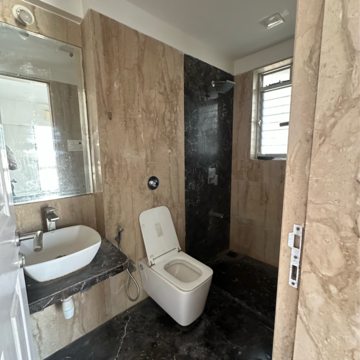 Bathroom in 3 BHK Apartment at Divine Aspen Garden, Sonawala Industry Estate – for Sale
