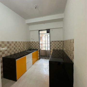 Kitchen in 3 BHK Apartment at Divine Aspen Garden, Sonawala Industry Estate – for Sale
