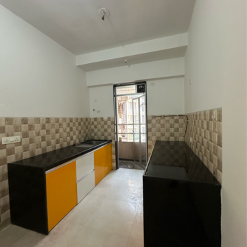 Kitchen in 3 BHK Apartment at Divine Aspen Garden, Sonawala Industry Estate – for Sale