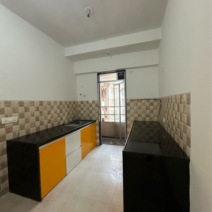 Kitchen, divine-aspen-garden 3 Bedroom 928 Sq.Ft. Apartment In Sonawala Industry Estate Mumbai 7937548