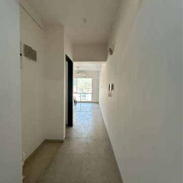Building Lobby in 3 BHK Apartment at Divine Aspen Garden, Sonawala Industry Estate – for Sale