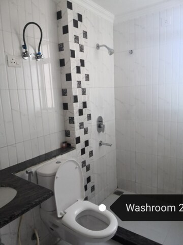Bathroom in 3 BHK Apartment at Unitech Uniworld Resorts-The Residences, Sector 33 – for Rent