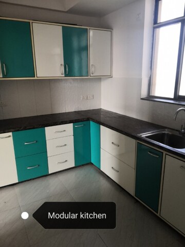 Kitchen in 3 BHK Apartment at Unitech Uniworld Resorts-The Residences, Sector 33 – for Rent