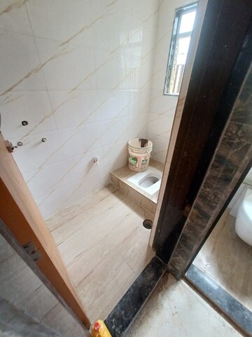 Bathroom in 1 BHK Apartment at Prakruti Heights Haware City, Haware City – for Sale