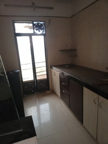 Kitchen in 2 BHK Apartment at Laxmi Paradise, Mira Road – for Rent