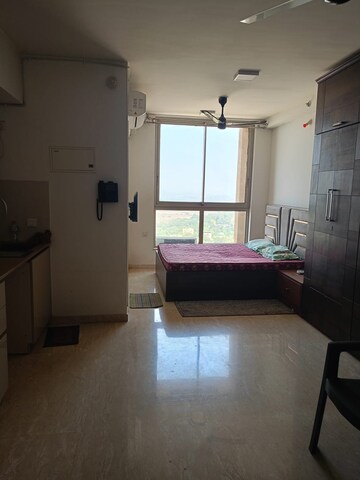 Living Room in Studio Apartment at Hiranandani Estate Solitaire C, Ghodbunder Road – for Rent