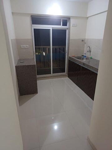 Kitchen in 2 BHK Apartment at Metropolis Rivera, Kasarvadavali – for Sale