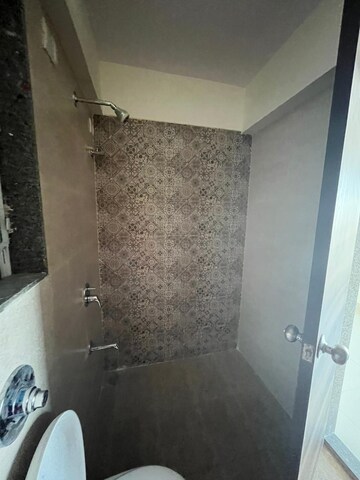 Bathroom in 2 BHK Apartment at Metropolis Rivera, Kasarvadavali – for Sale