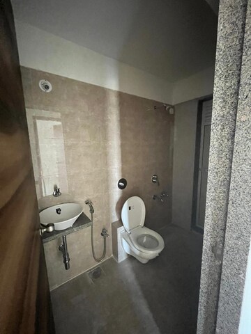 Bathroom in 2 BHK Apartment at Metropolis Rivera, Kasarvadavali – for Sale