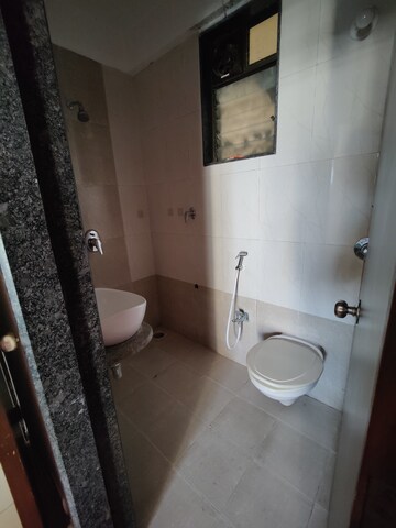 Bathroom in 1 BHK Apartment at Raunak Unnathi Woods Phase 7 A And B, Ghodbunder Road – for Rent