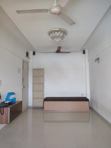 Living Room in 1 BHK Apartment at Liberty Corner CHS, Mira Road – for Rent