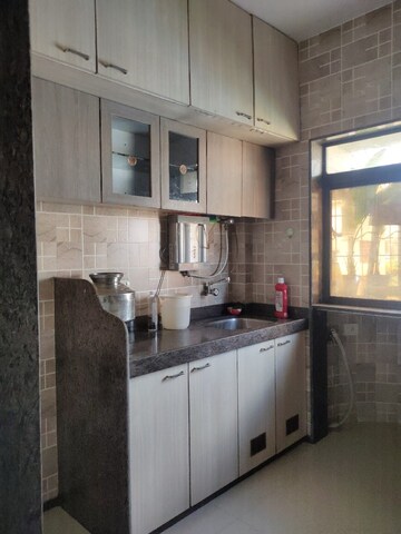 Kitchen in 1 BHK Apartment at Liberty Corner CHS, Mira Road – for Rent