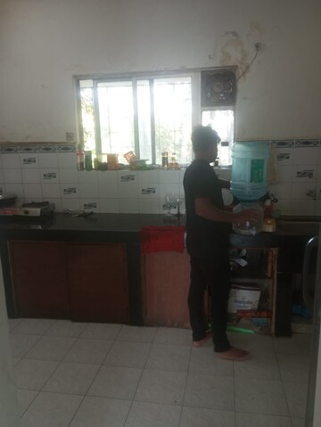 Kitchen in 2 BHK Apartment at Naiknavare Trinity Court, Koregaon Park – for Rent