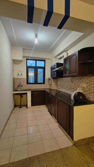 Kitchen in 3 BHK Apartment at Raison Armor Homes, Indrapuram – for Rent