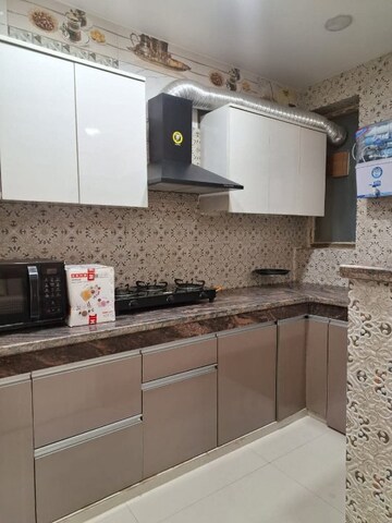 Kitchen in 1 BHK Apartment at Paras Tierea, Sector 137 – for Rent