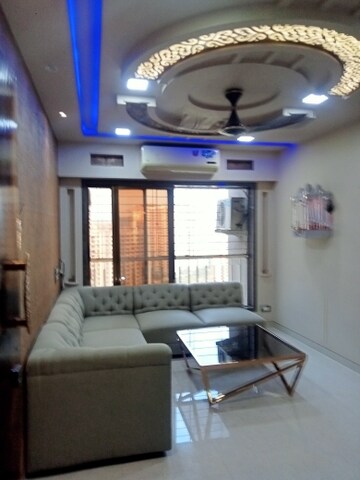 Living Room in 1 BHK Apartment at Strawberry Sandstone, Mira Road – for Rent