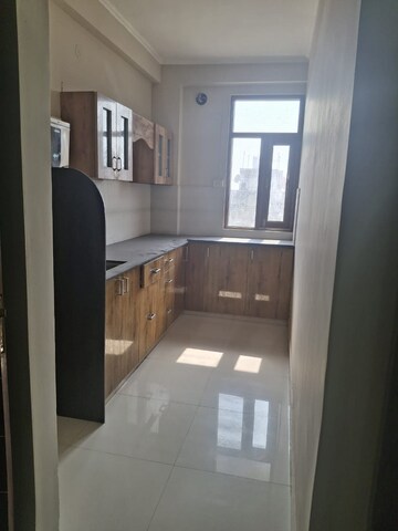 Kitchen in 3 BHK Builder Floor at Mansarovar Extension – for Sale