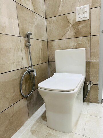 Bathroom in 3 BHK Apartment at Roseate Homes, Ghazipur – for Rent