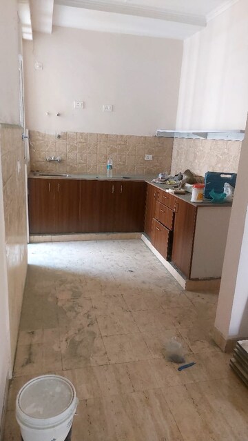 Kitchen in 2 BHK Apartment at Amrapali Golf Homes, Sector 4 Greater Noida – for Sale