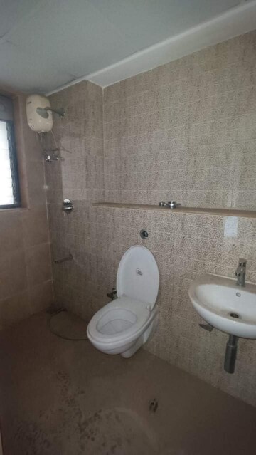 Bathroom in 1.5 BHK Apartment at Lodha Palava City, Dombivli East – for Rent